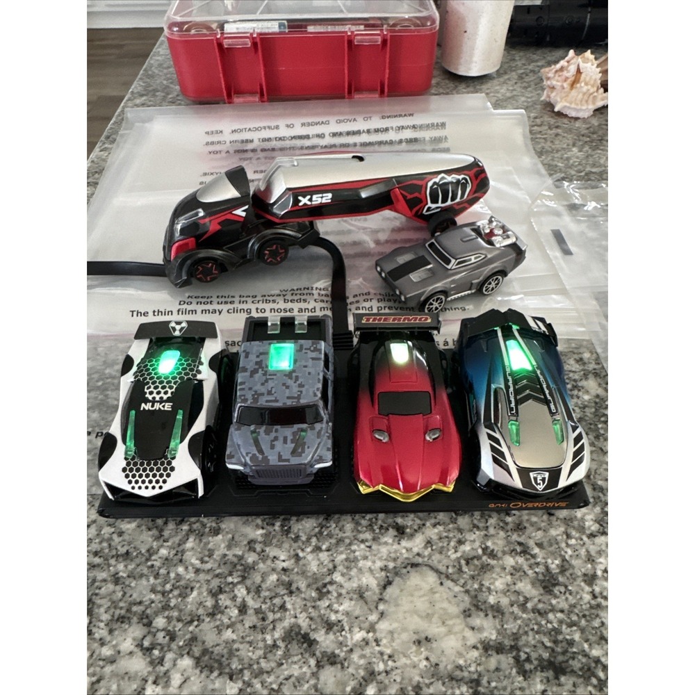 6 Anki Drive Cars & Semi w/ Charging Pods #019